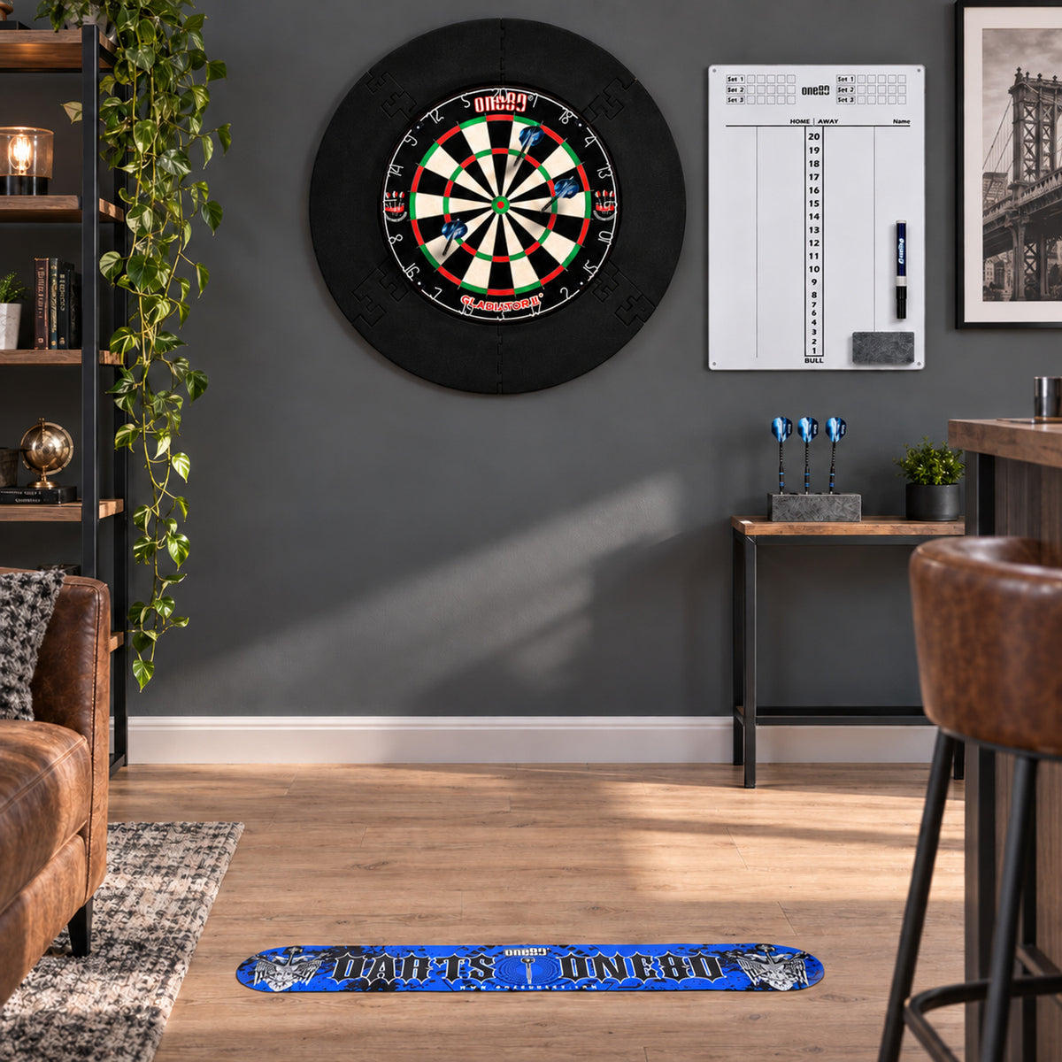 ONE80 bristle dartboard set installed in a modern home game room